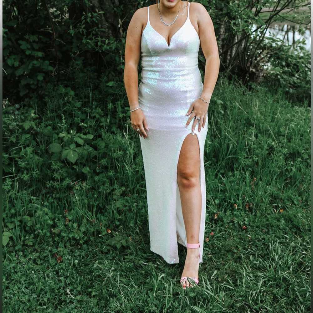 White iridescent sequin gown size small 
only worn for three hours max NEED GONE